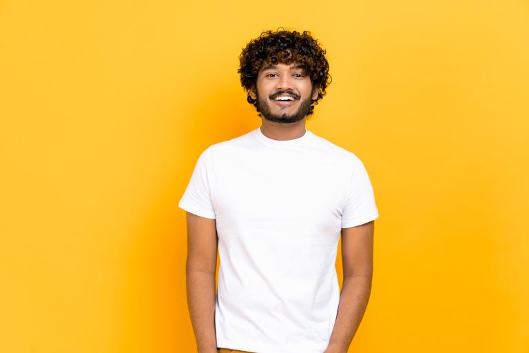 Young man and yellow background