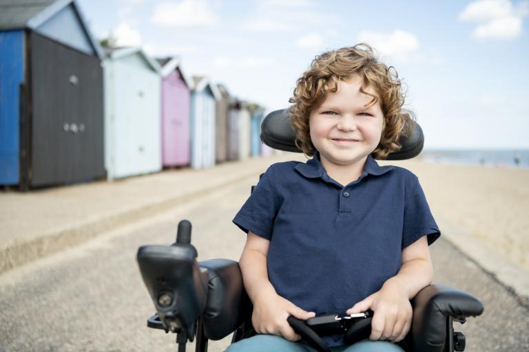 young boy in wheelchair