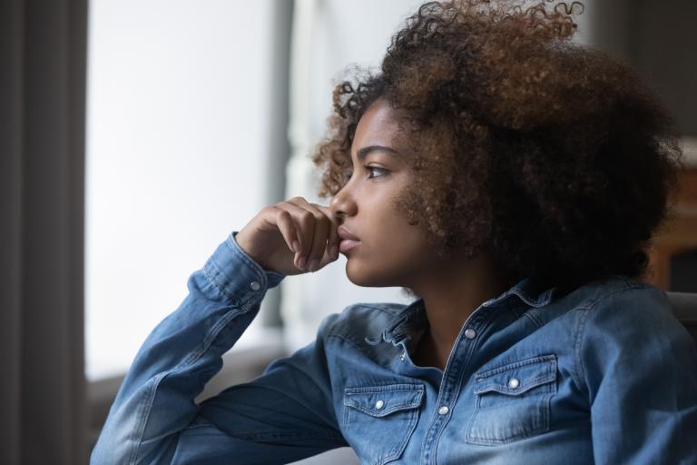 Girl looking deep in thought 