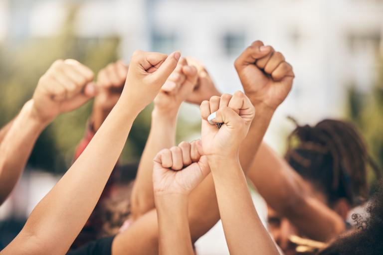 Group of hands in the air 