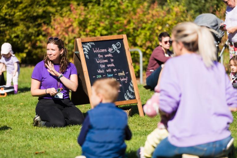 Open space with families and Parks Trust colleague